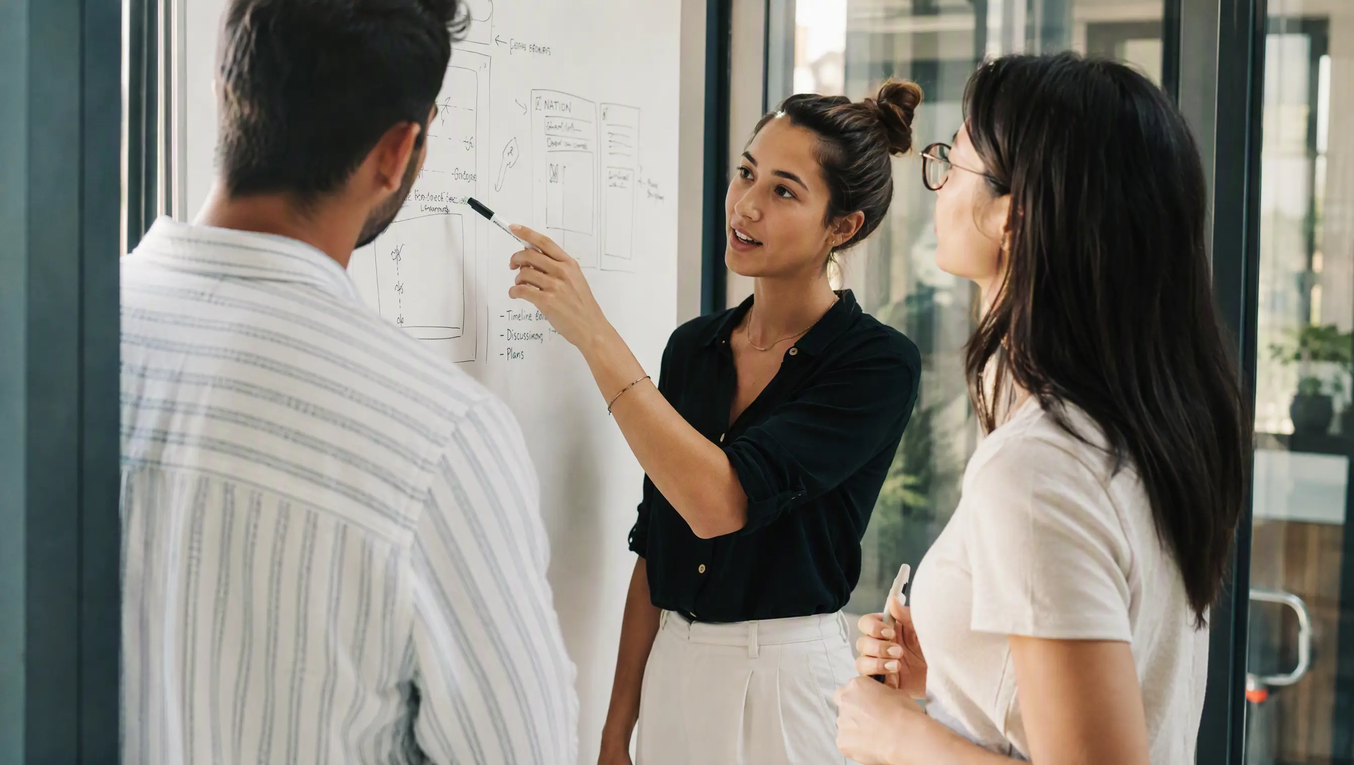 7 Employee Referral Program Mistakes and How to Fix Them 3 HR professional reviewing a referral program dashboard, representing Discovered's automation tools