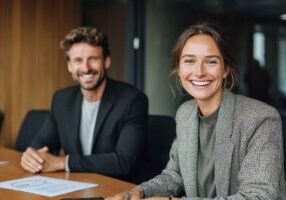HR manager reviewing a candidate’s automated reference check report during a meeting.