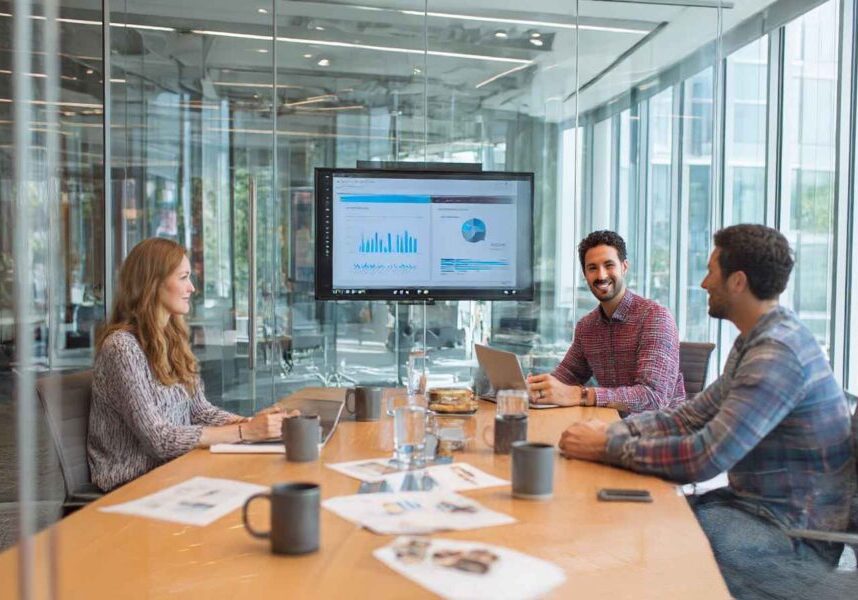 A hiring team reviewing structured reference check feedback in a collaborative session