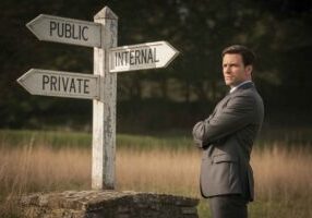 Recruiter standing at crossroads with signs for public, internal, and private postings, symbolizing strategic hiring choices.